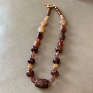 DZI and agate bead necklace w gold tone toggle clasp. Great fall colors.